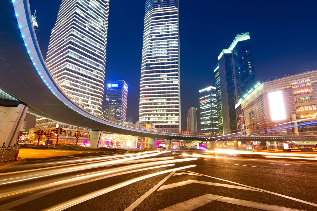 CREATOR: gd-jpeg v1.0 (using IJG JPEG v62), quality = 95 Motion blur view of night traffic in downtown Shanghai. / 123rf Image #13519816