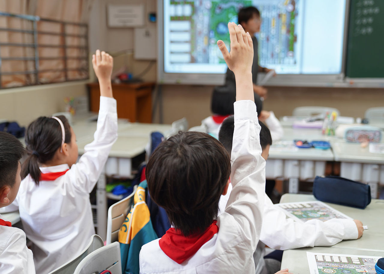Students raising their hand